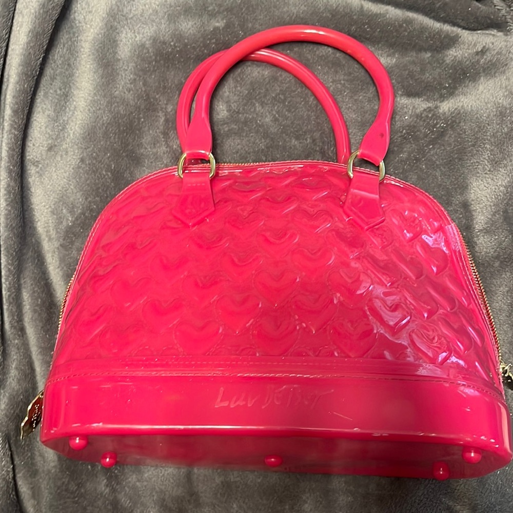 Used Fushia Betsey Johnson bag.